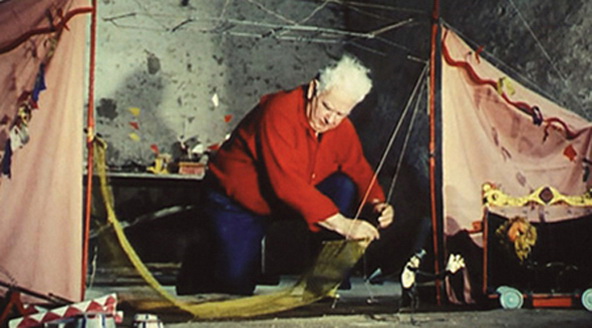 © Alexander Calder with Calder Circus, still image from Carlos Vilardebo's 1961 film of Alexander Calder's "circus". Courtesy of Fondation Calder.